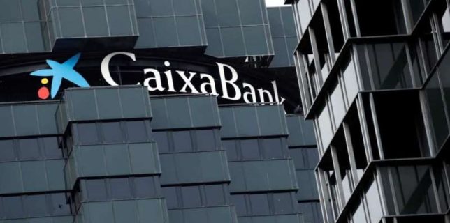 Caixabank şi Bankia formează cel mai mare grup bancar spaniol, cu active de 650 de miliarde de dolari