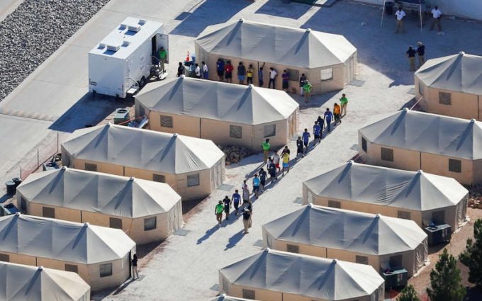 Immigrant children now housed in a tent encampment under the new „zero tolerance” policy by the Trump administration are shown walking in single file at the facility near the Mexican border in Tornillo, Texas