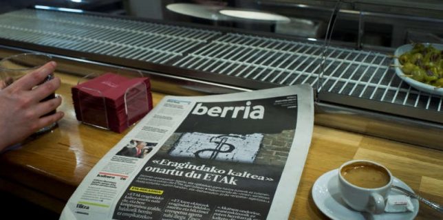 Basque language newspaper Berria displays a photograph with the symbol of armed Basque separatists ETA following groups apology, in Bilbao